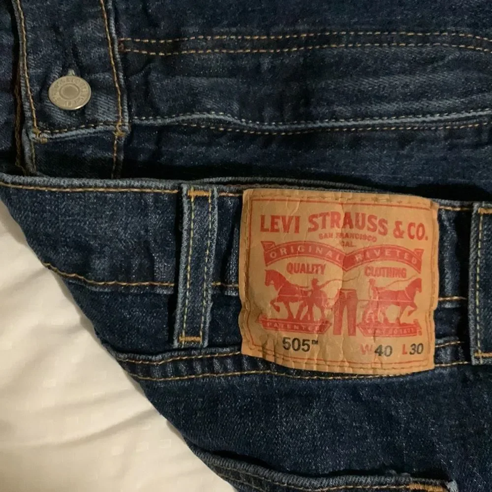 Levi's 505 blue jeans 40x29 inseam slightly altered